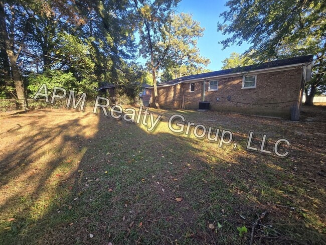 Building Photo - Four-bedroom house off North Main