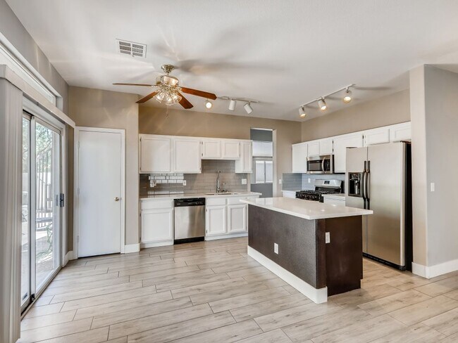 Building Photo - SPACIOUS & ELEGANT LIVING IN THIS GATED HE...
