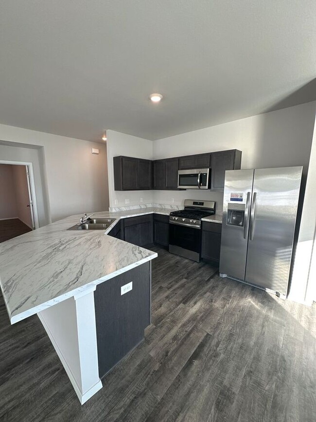 Building Photo - *Pre-leasing* BRAND NEW Three Bedroom | Tw...