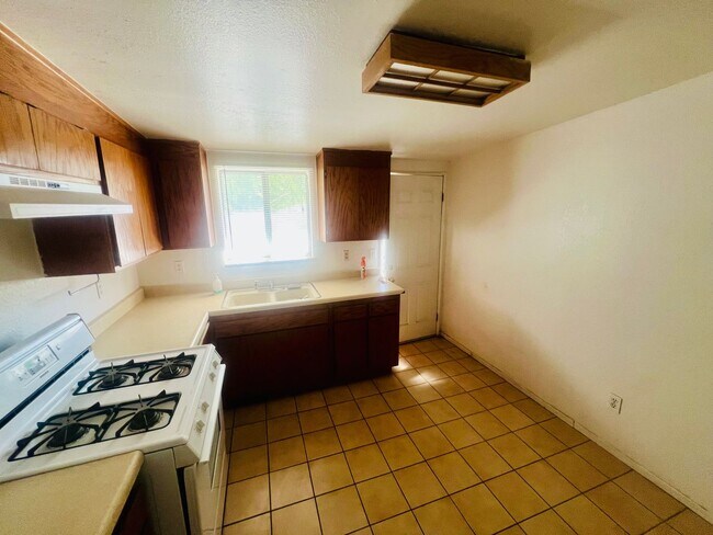 Building Photo - Charming 3-Bedroom Home including 250sqft ...