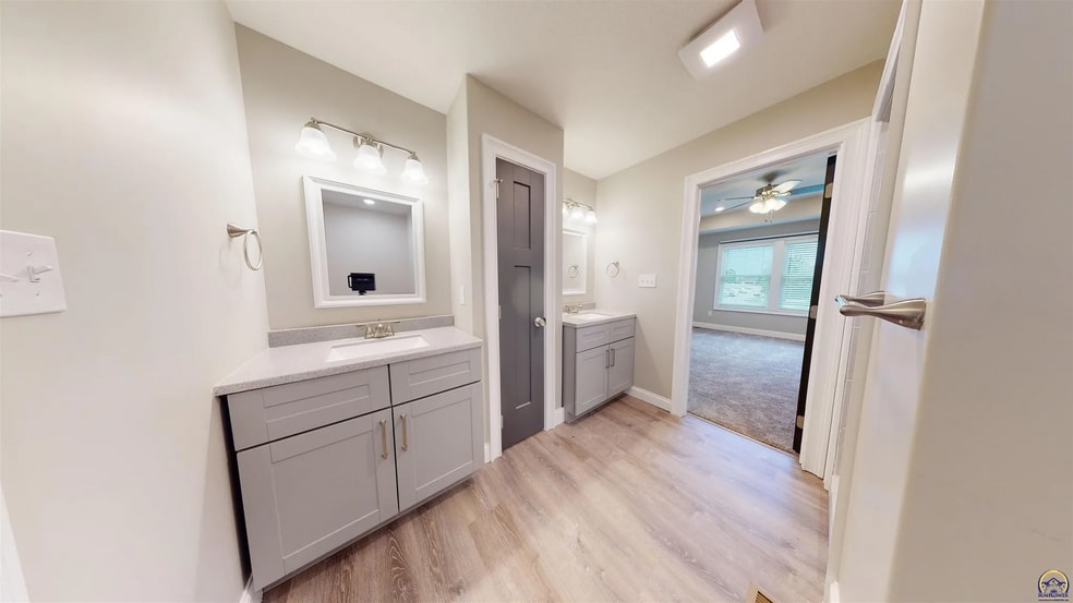 Primary Bath with dual vanities - 3755 SW Summerfield Dr
