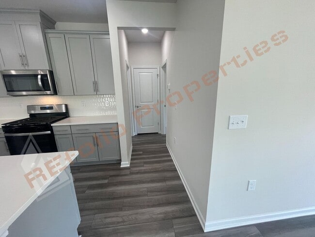 Building Photo - Great news! Application fee will be credit...