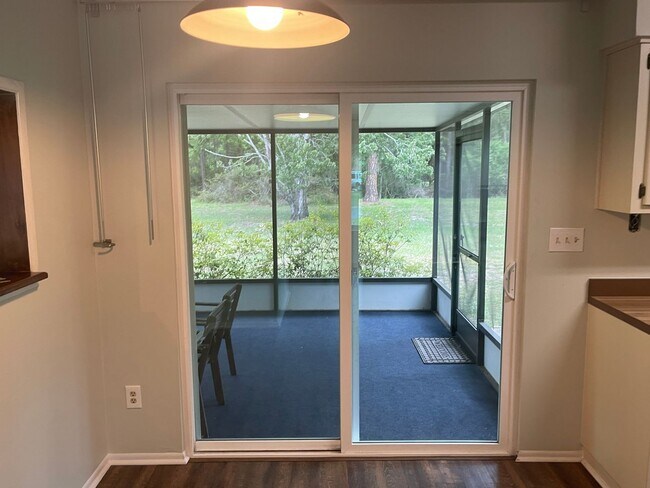 Building Photo - 3/2 (Northwood Oaks) Beautiful split floor plan home with custom brick accents and large landscap...