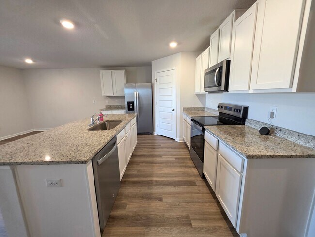 Building Photo - Nearly New 4BR/2BA home close to I10 with energy savings built in