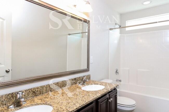 Building Photo - Prepare to fall in love with this 4 bedroom, 2.5 bathroom home