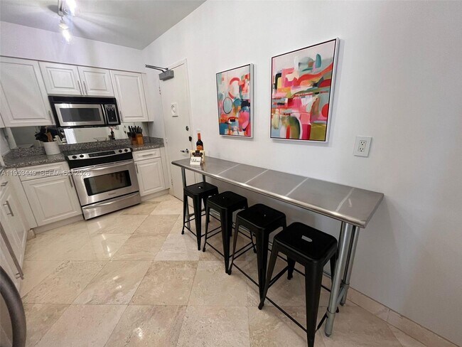 Building Photo - 9195 Collins Ave