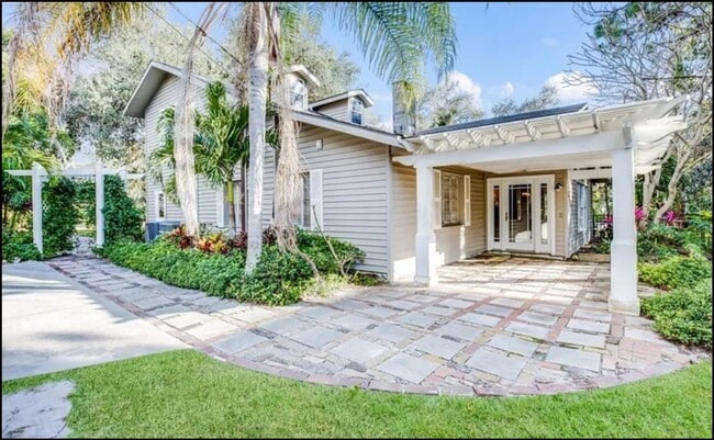 Building Photo - Furnished home on Palma Sola Bay with dock and pool