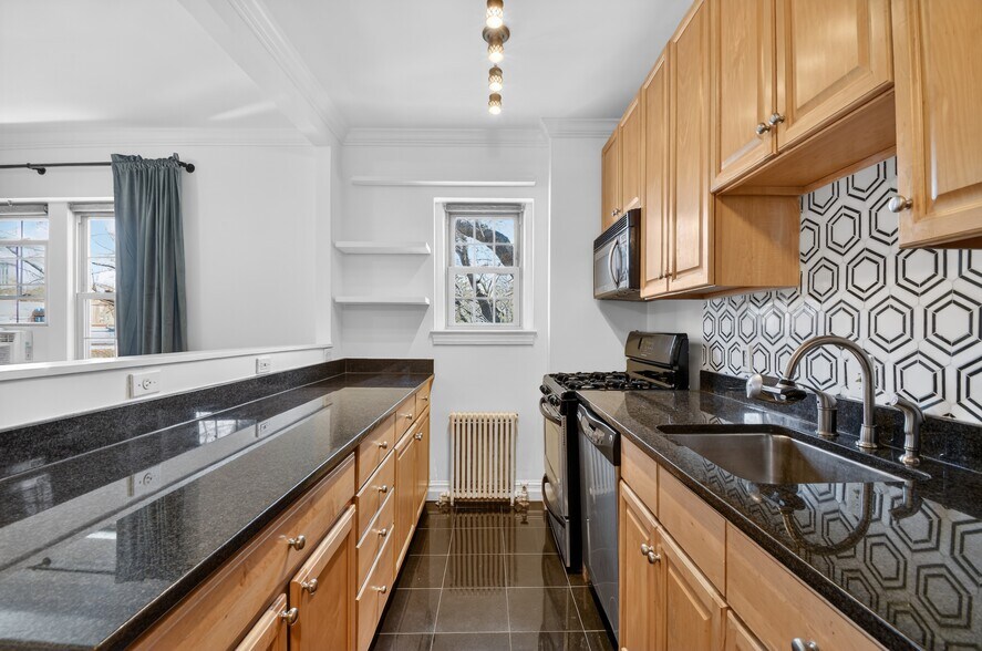 Updated kitchen with granite countertops - 3925 Davis Pl NW