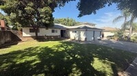 Building Photo - 4829 E Santa Ana Ave