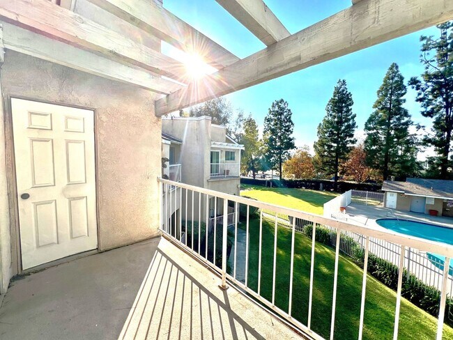 Building Photo - 2-Bedroom, 2-Bath Upstairs Condo Unit in Gated Pomona Community, Water/Trash/HOA Included!