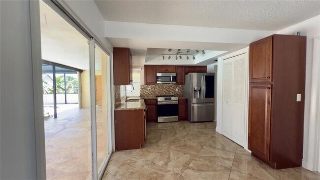 Building Photo - 6957 NW 9th Ct