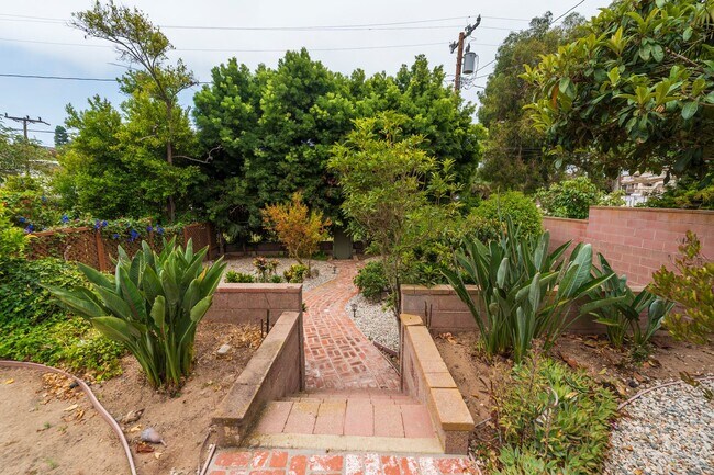Building Photo - One-of-a-Kind Riviera Home Backing to El R...