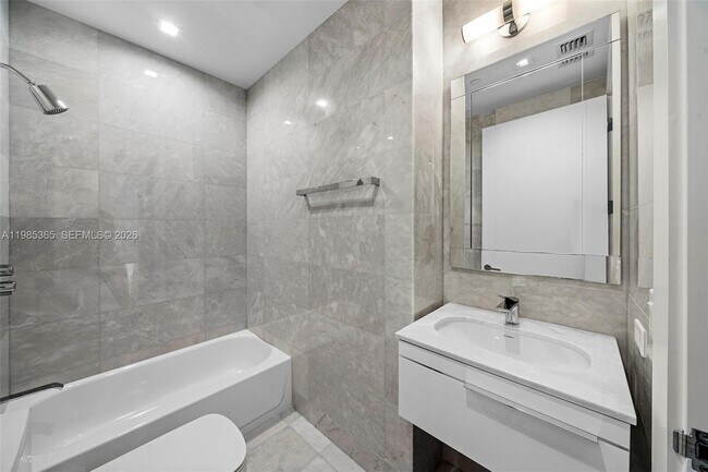 Building Photo - 18501 Collins Ave