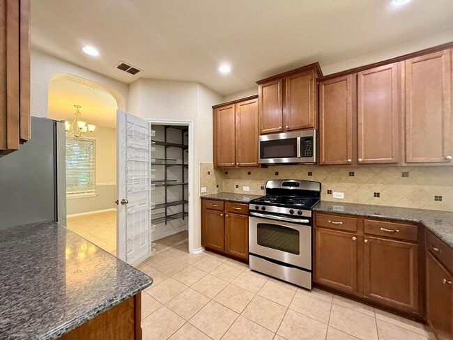 Building Photo - Spacious and Beautiful Two-Story 5 Bedrooms, 3.5 Bathrooms Home, With Easy Access to I-35, Loop 1...
