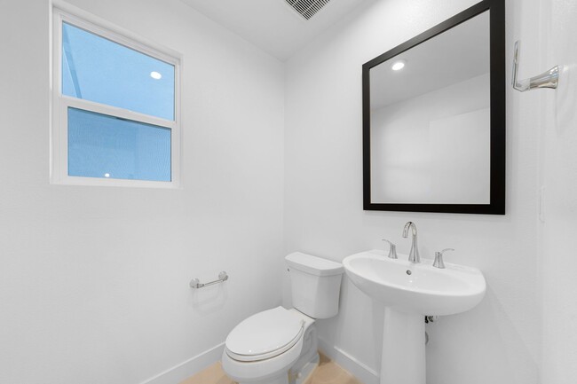 Building Photo - Available now! Brand New 4 Bedroom Townhom...