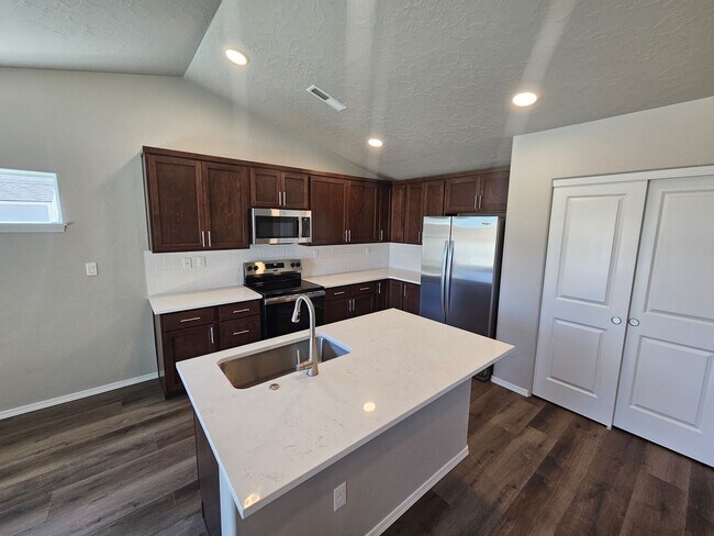 Building Photo - Brand New Home with RV Pad and Premium Fin...