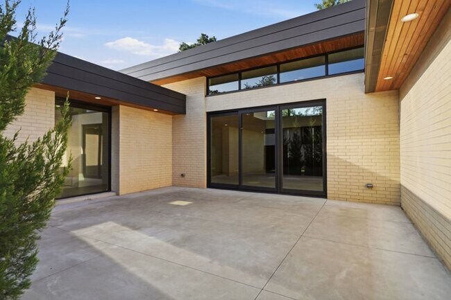 Building Photo - Experience contemporary luxury in this exceptional custom-built Midtown Tulsa residence, where so...