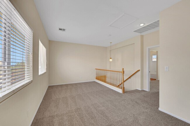 Building Photo - This beautifully updated 2-bedroom home is nestled in a gated community