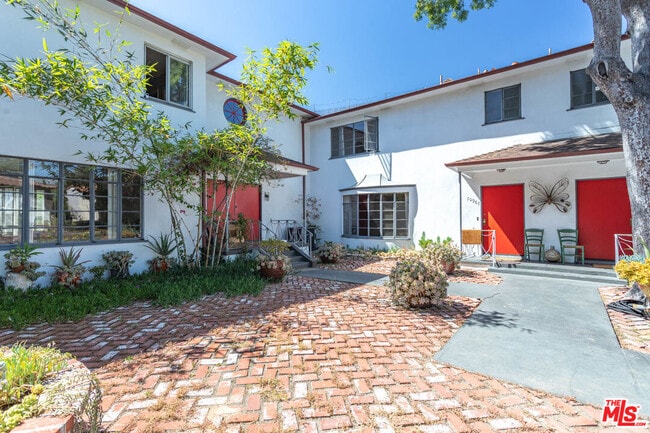 Building Photo - 10959 Strathmore Dr
