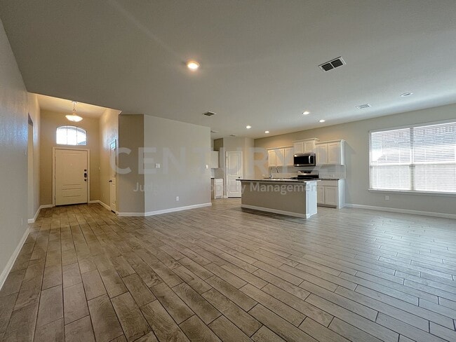 Building Photo - Crisp and Clean 4/2/2 in Boyd For Rent!