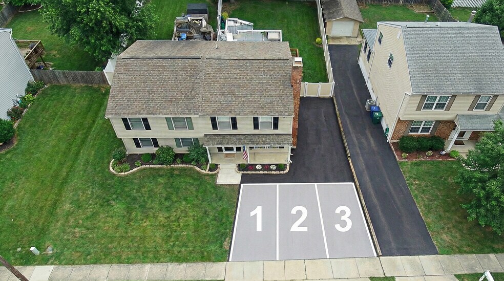 Dedicated parking space plus street parking for guests - 6471 Grommet Dr