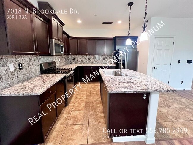 Building Photo - 7018 N Brookdale Dr