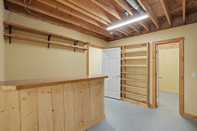 Building Photo - Backs to Open Space | Over 4,000 Sq Ft | Updated Kitchen + Solar