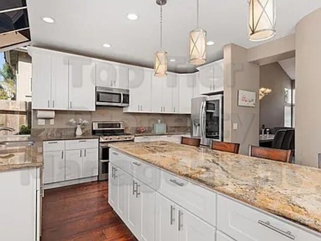 Building Photo - Luxurious 5-Bedroom Rancho Del Oro Home with Solar – Available Now!