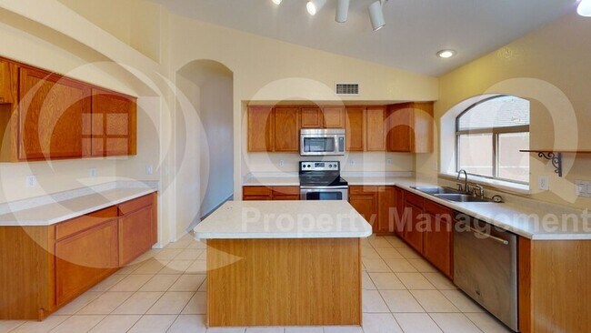 Building Photo - 9953 E Onza Ave