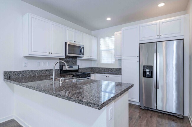 Building Photo - Modern, Move-In Ready Home with Attached 2-Car Garage