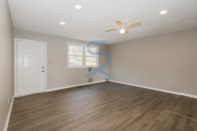 Building Photo - Move in before December 15th and choose your reward: a $250 Amazon Gift Card or a 55" Smart TV!