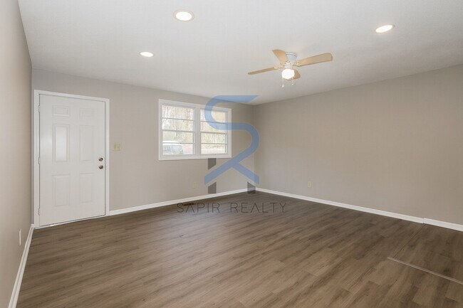 Building Photo - Move in before December 31st and choose your reward: a $250 Amazon Gift Card or a 55" Smart TV!