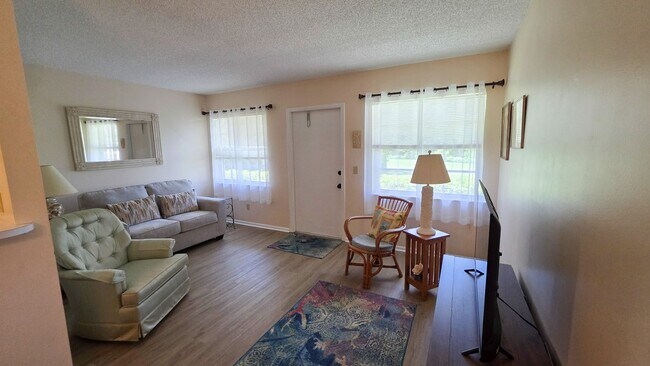 Building Photo - ANNUAL RENTAL 1/1 COMING SOON 55+