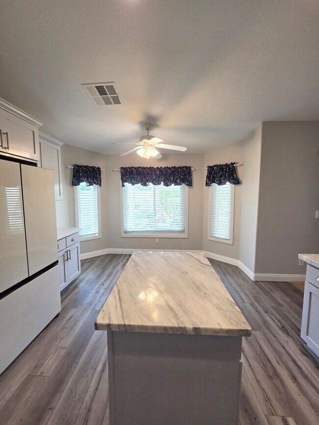 Building Photo - Gated Single-Story Home with Heated Pool, RV Parking & 3-Car Garage