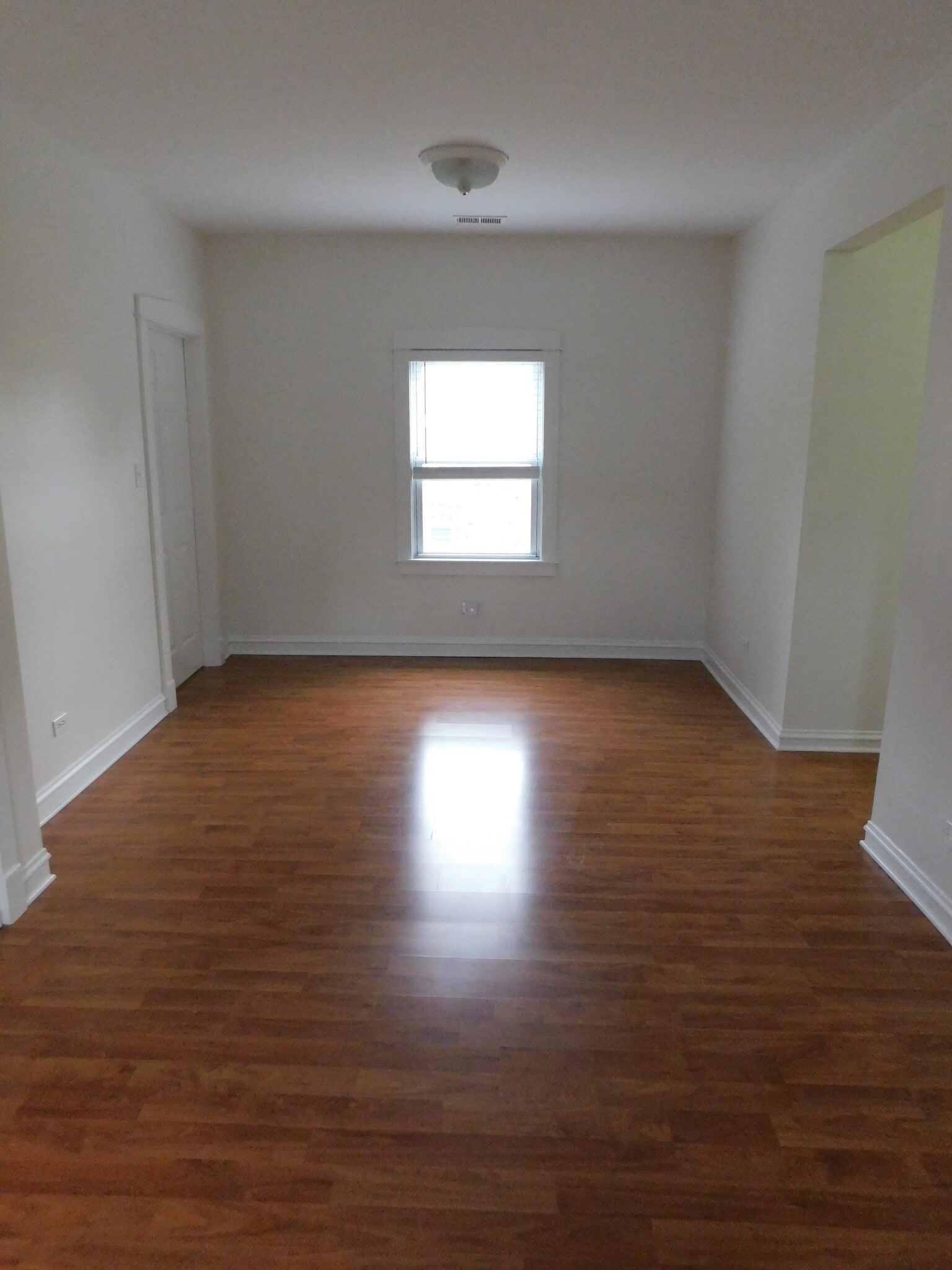 South view of family room. Flooring being replaced. - 1566 Dewey Ave