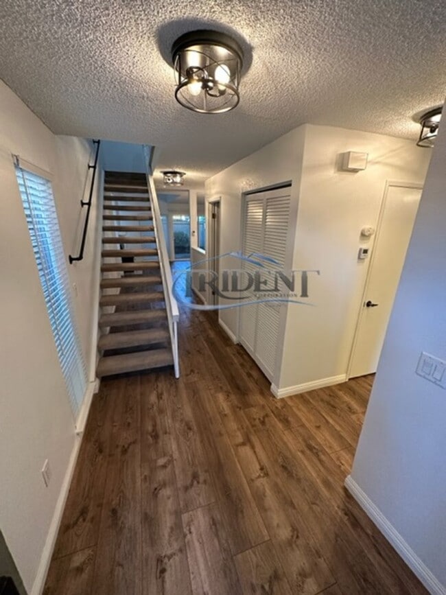 Building Photo - 3 bedroom, 2 ½ bath townhouse, located in The Grove gated community