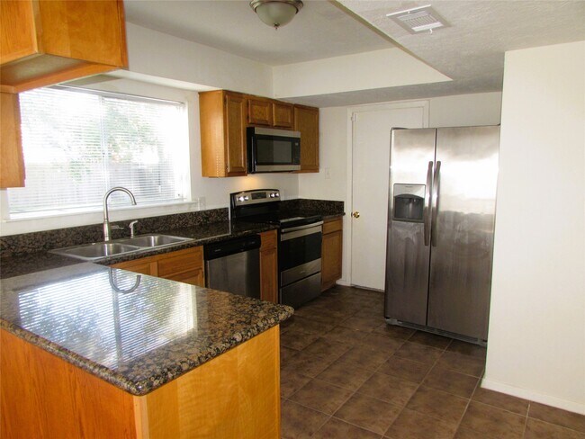 Building Photo - 16706 Running Quail Ct