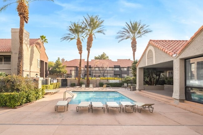 Building Photo - Upgraded Three-Bedroom Condo with Wood Flooring and Modern Comforts!