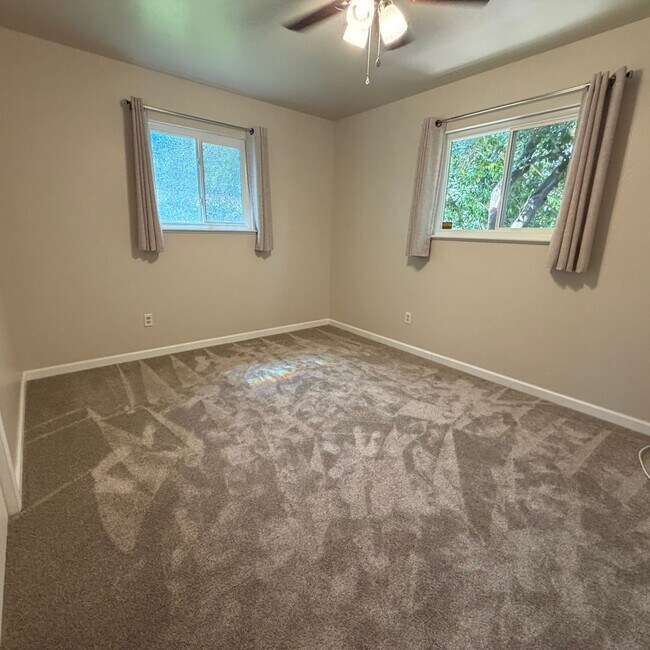 Building Photo - Adorable house with large deck,  yard and RV access