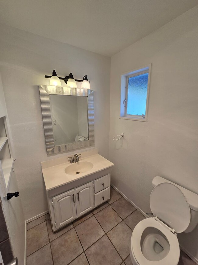 Building Photo - What!!! Less than $1.00 per square foot!!! Nice size 4 Bedroom  2 Bath with 2 living areas in the...