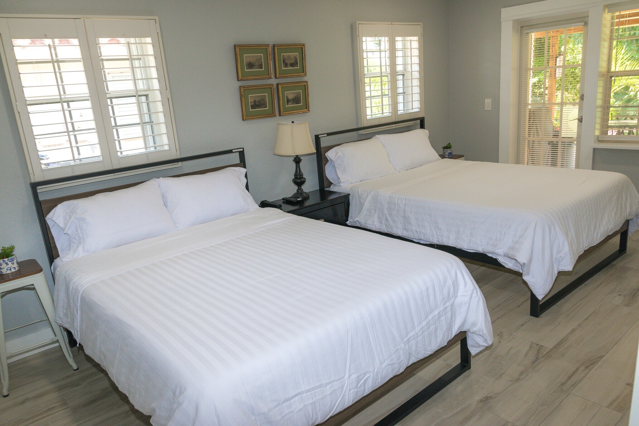 Bedroom #1 (Sleeps 4) - 2 Queen 12" Memory Foam Mattress, 55" TV with Complimentary Cable & Netflix - 4540 NW 12th Dr