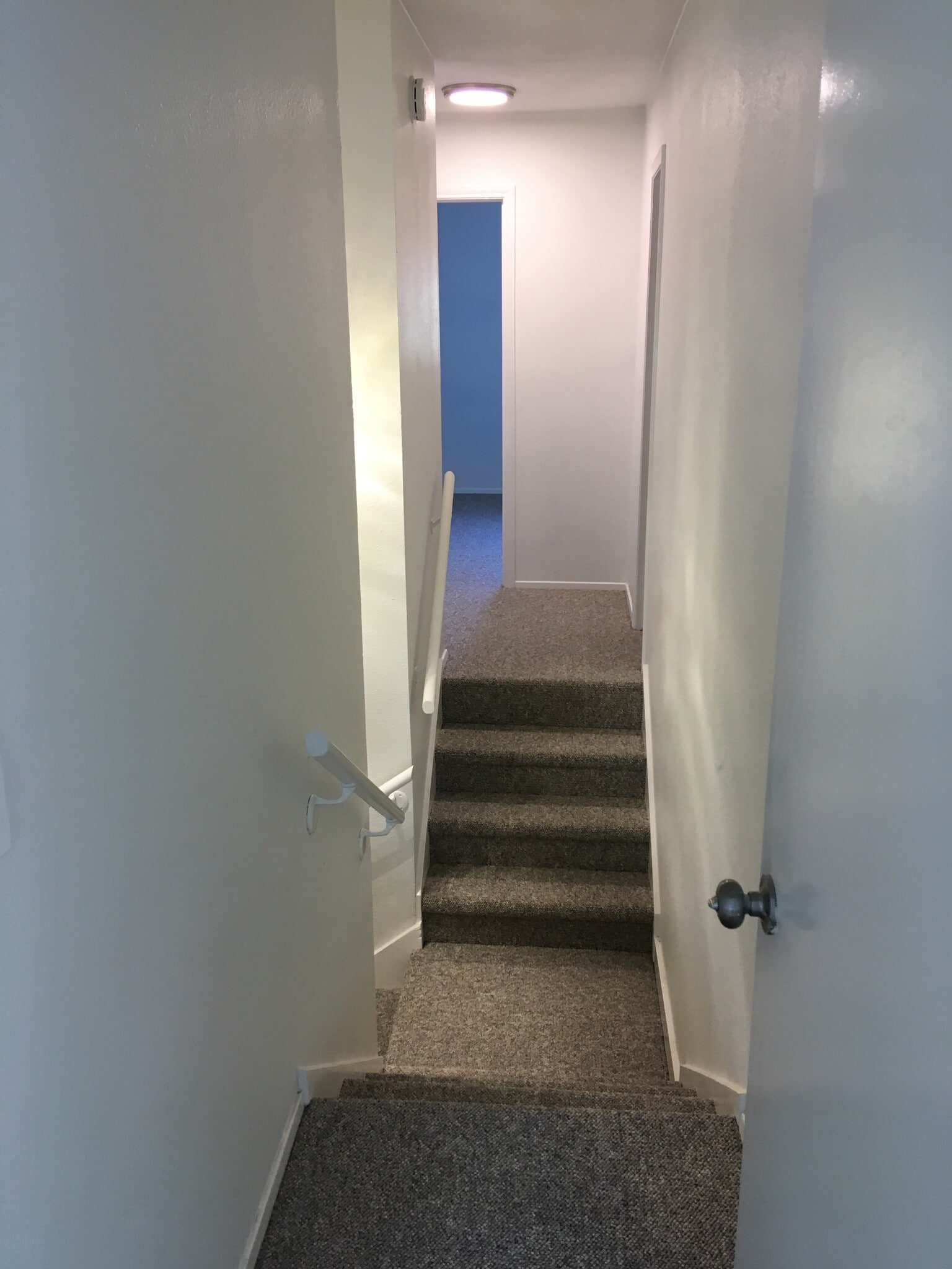 Stairs split at top for privacy, master on right and 2 bedrooms and 1 bath on left. - 8604 Willowick Drive