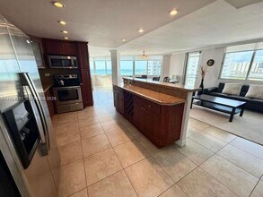 Building Photo - 7135 Collins Ave