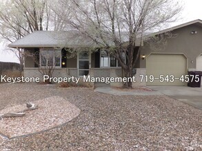 Building Photo - Spacious Pueblo West Duplex - 2 Bedroom/1 ...