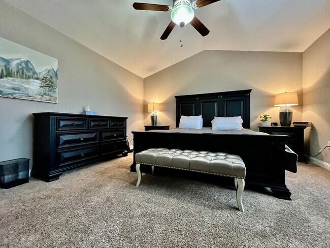 Building Photo - Executive corporate rental features community pool. Fully furnished and includes all utilities.