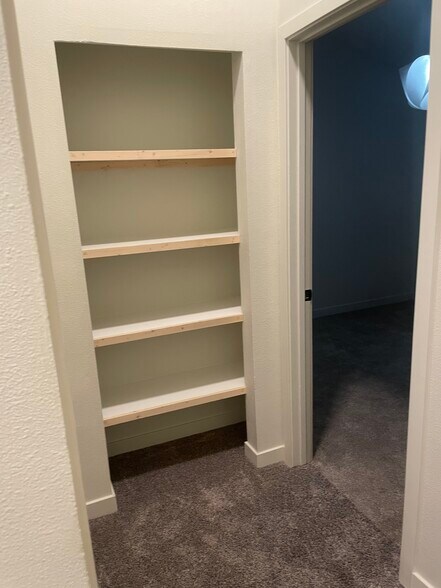 Hallway Shelving - 716 N. State St.