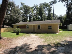 Building Photo - Nice 4 bedroom/2 Bathroom home