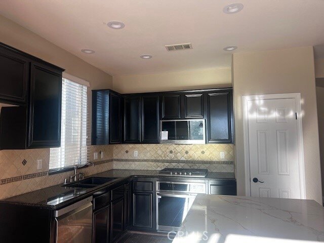 Building Photo - 8945 Honeysuckle Ave