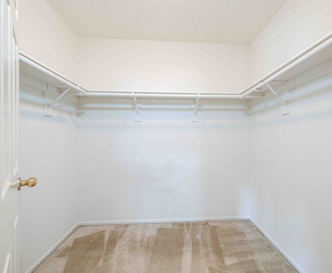 Building Photo - Gated Townhome with Updated Kitchen and Private Backyard