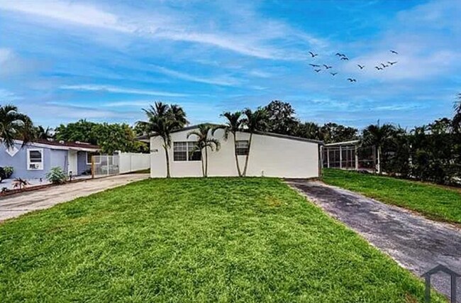 Building Photo - Charming 4-Bedroom Home in Margate, FL – Security Deposit Special: Only $1,500 with Approved Credit!